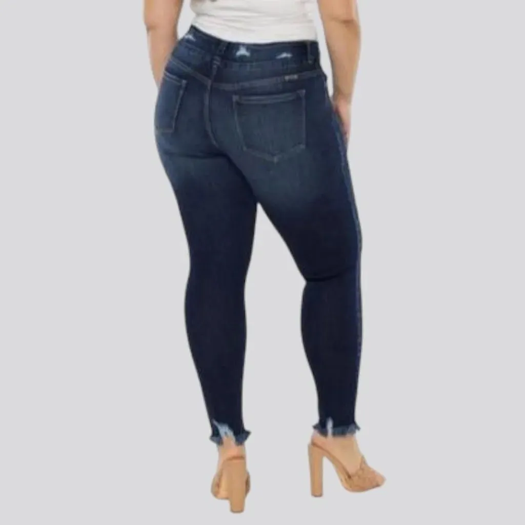 Distressed-hem sanded jeans for women